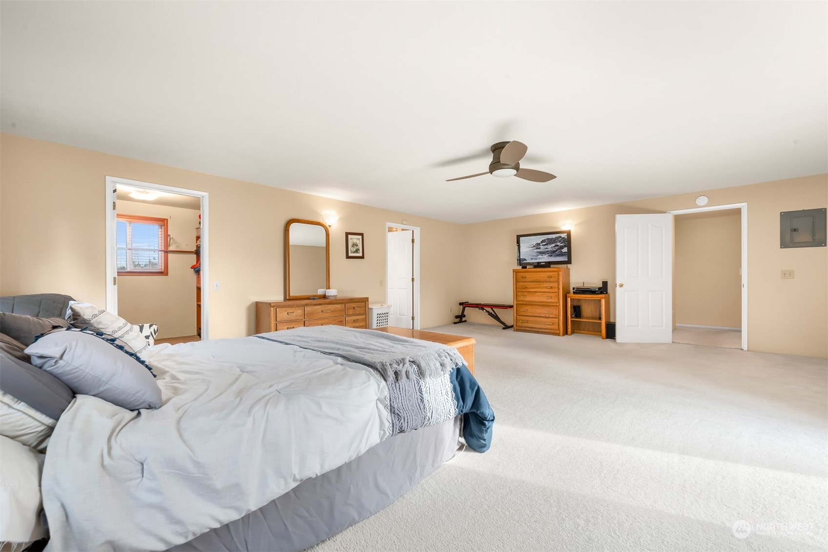 3941 Loomis Trail Road Blaine, WA 98230 - Photo 8 of 40 a spacious bedroom with a bed and dresser