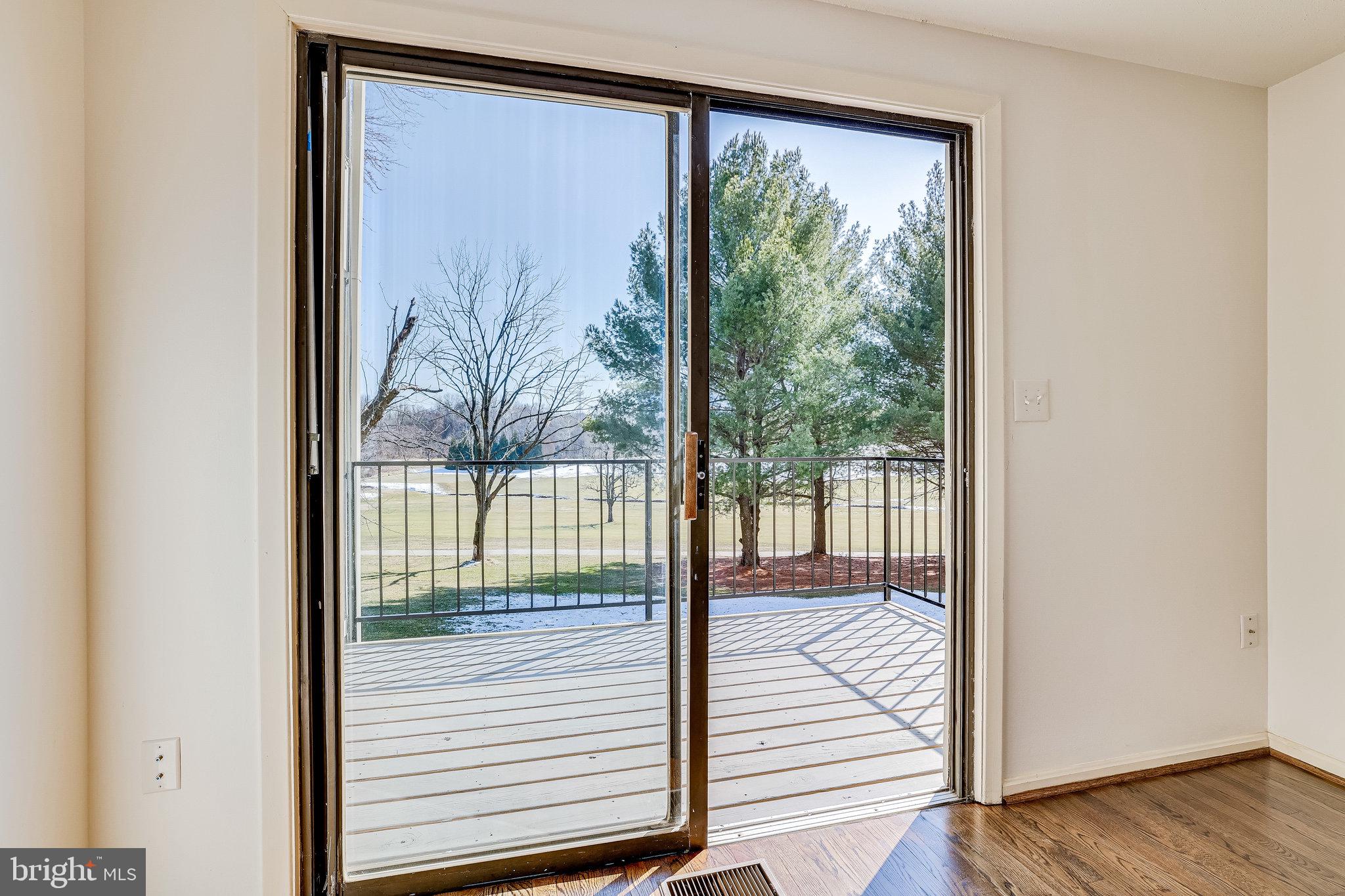 1813 North Shore Court Reston, VA 20190 - Photo 12 of 39 Sliding glass door takes you out to the deck