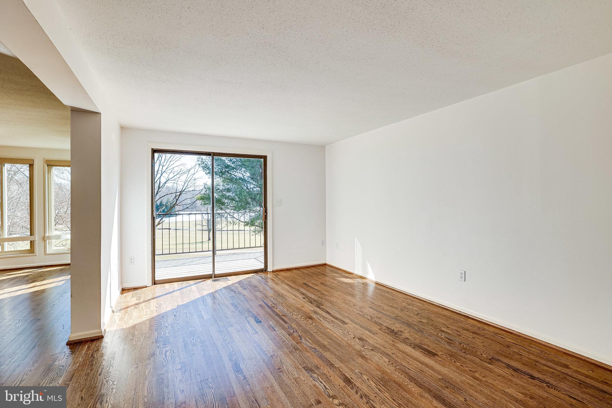 Refinished hardwood floors throughout living area