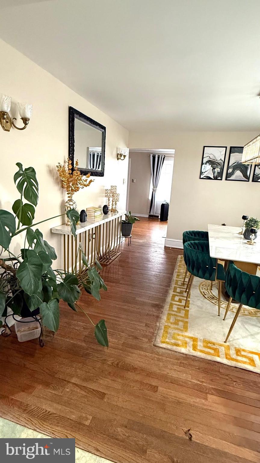 654 Buckshutem Road Bridgeton, NJ 08302 - Photo 3 of 14 a living room with furniture and a wooden floor