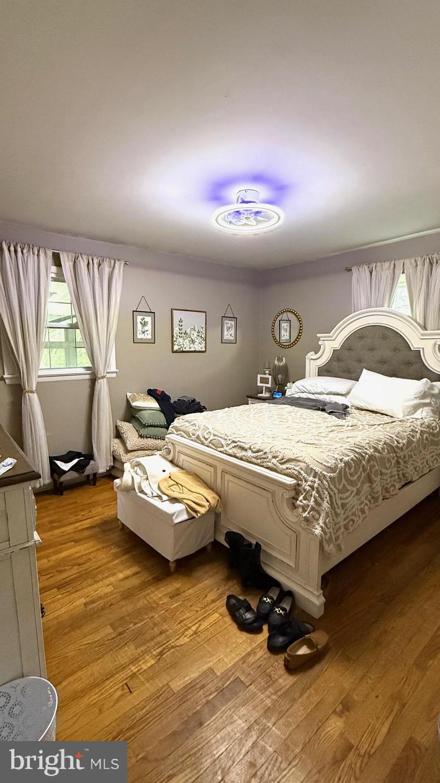 654 Buckshutem Road Bridgeton, NJ 08302 - Photo 5 of 14 a bedroom with bed and window