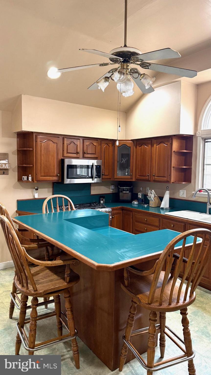 654 Buckshutem Road Bridgeton, NJ 08302 - Photo 8 of 14 a view of a dining room with furniture