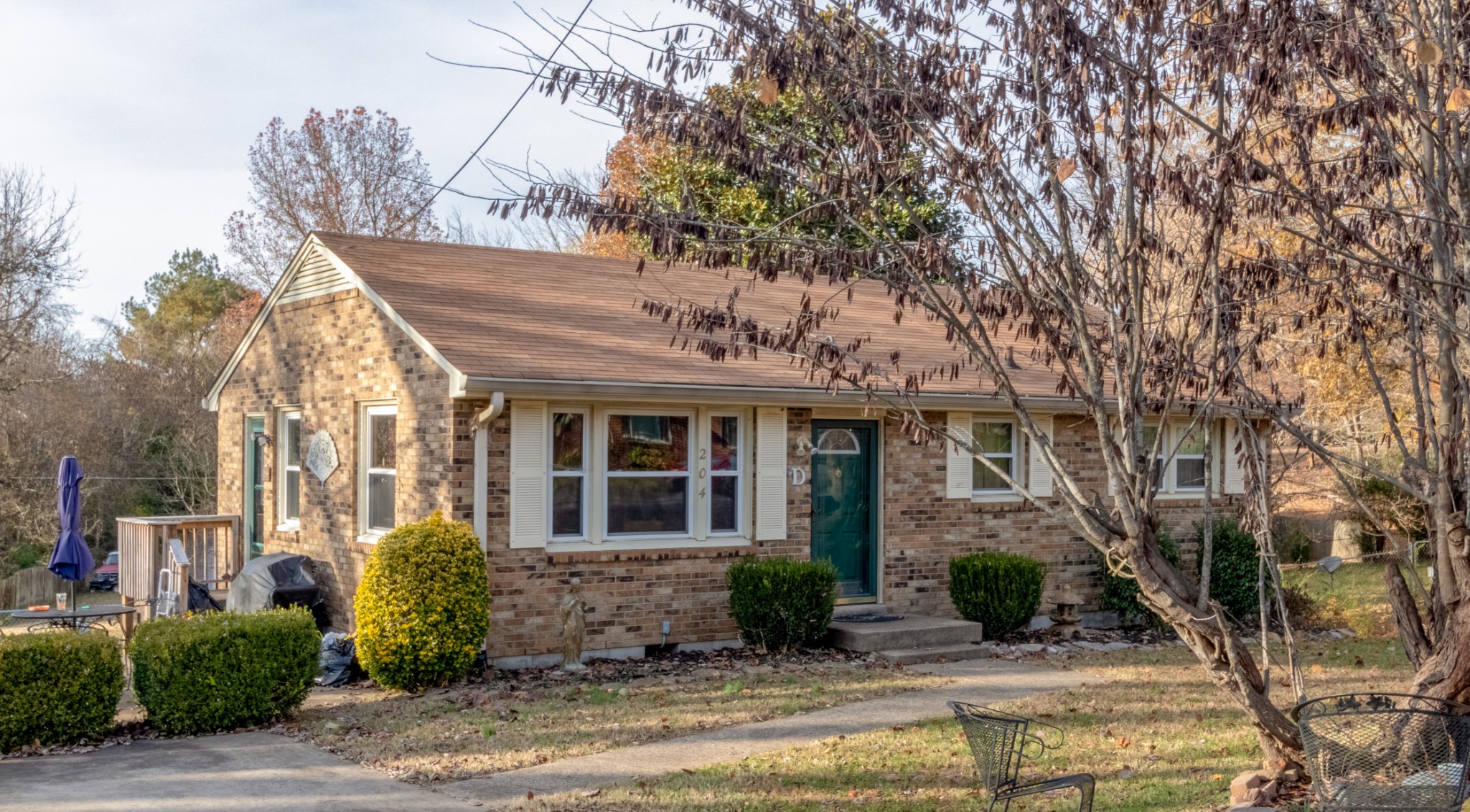 204 Paddock Road Clarksville, TN 37043 - Photo 5 of 29 a front view of a house with a tree