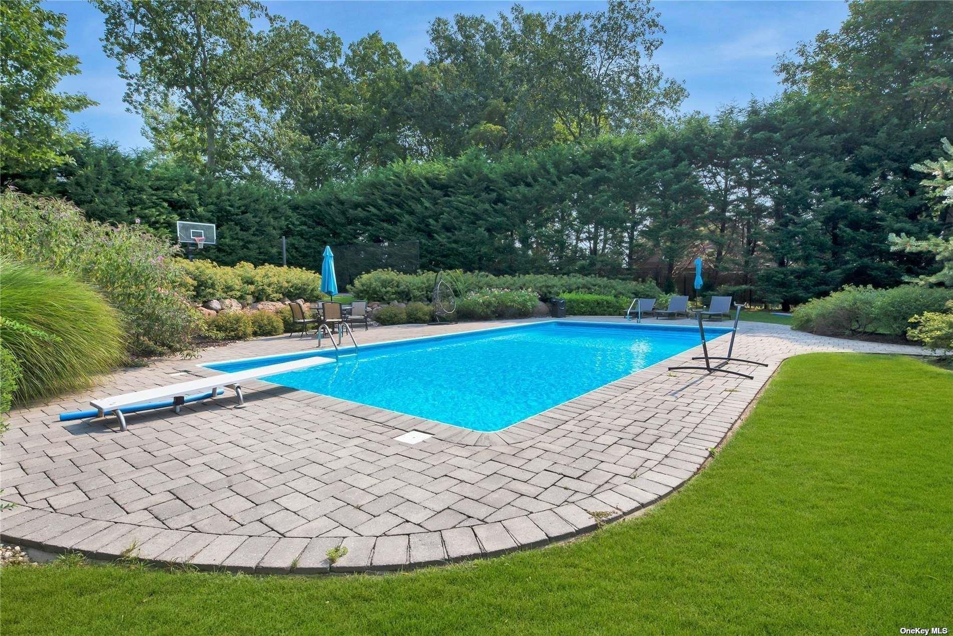 a view of a park with large trees