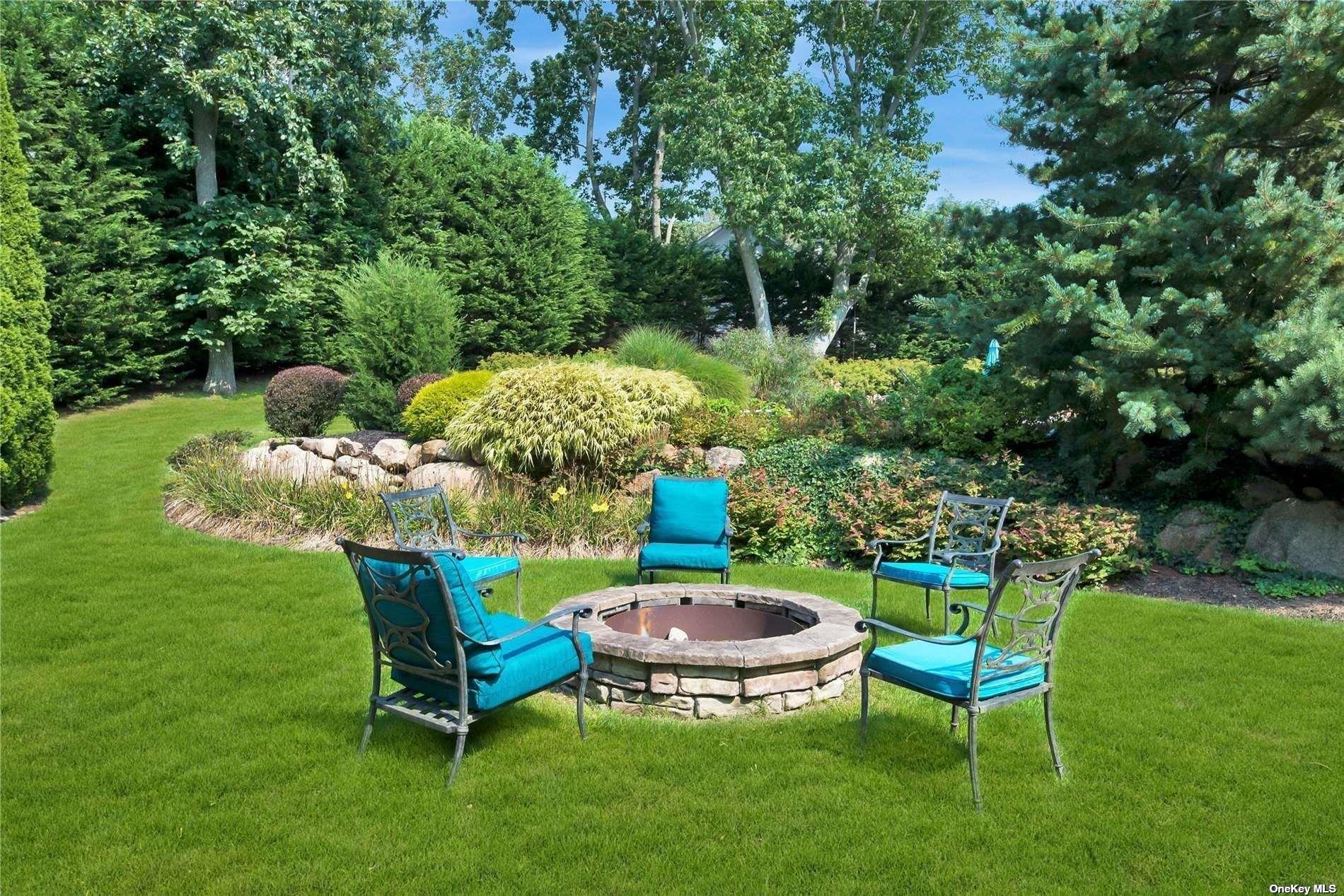 1460 Hillcrest Drive Orient, NY 11957 - Photo 35 of 37 a view of a chairs and table in the garden