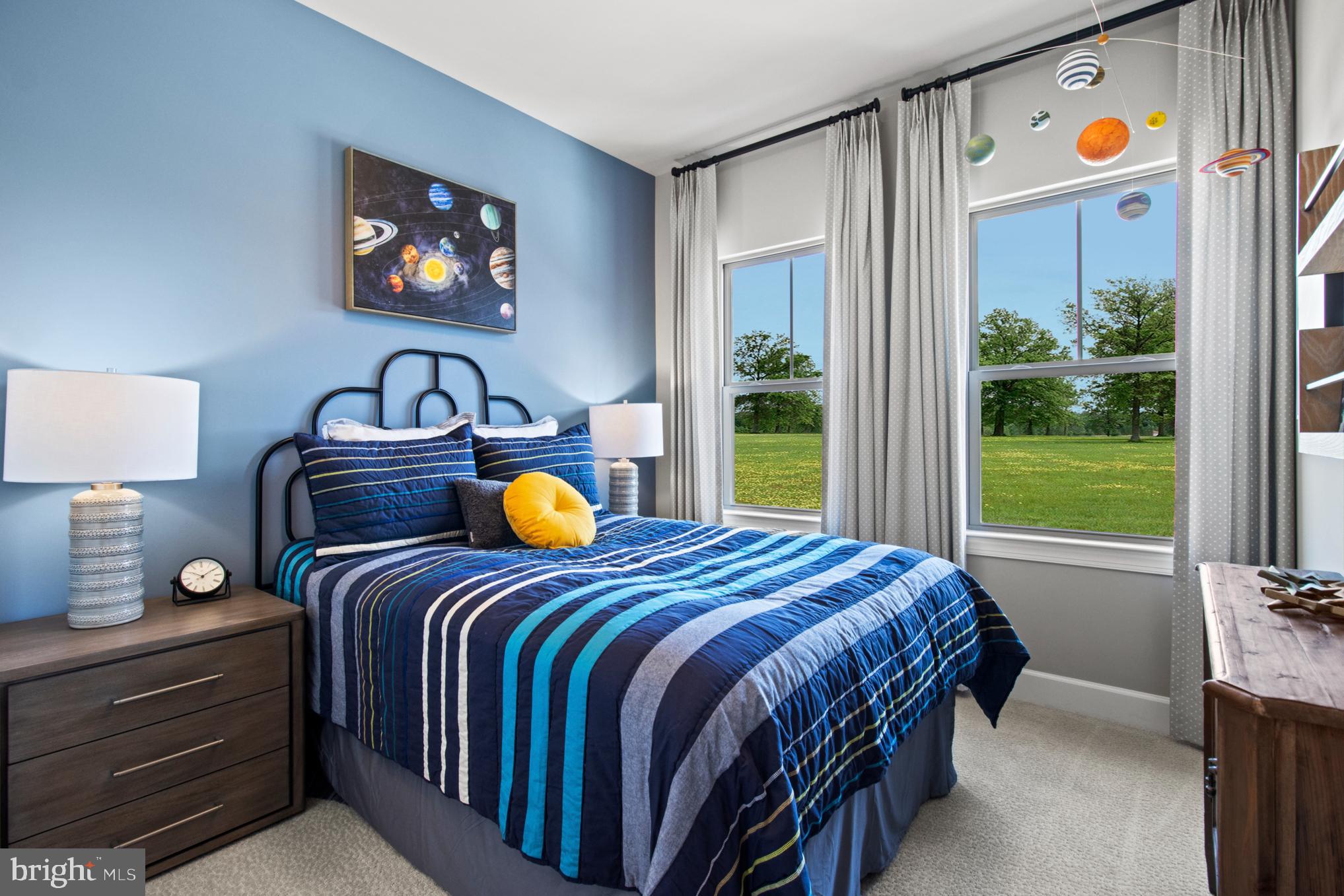 6812 Matthews Road Bryans Road, MD 20616 - Photo 13 of 32 a bedroom with a bed and a window
