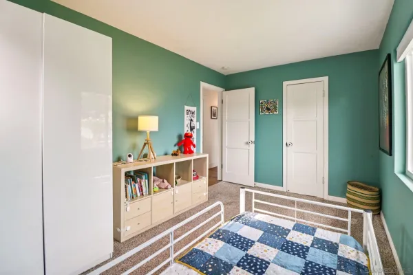 a living room with furniture and a rug
