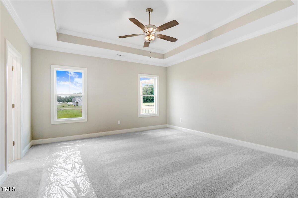 9550 Bear Run Lane Middlesex, NC 27557 - Photo 21 of 32 a view of room with window and ceiling fan