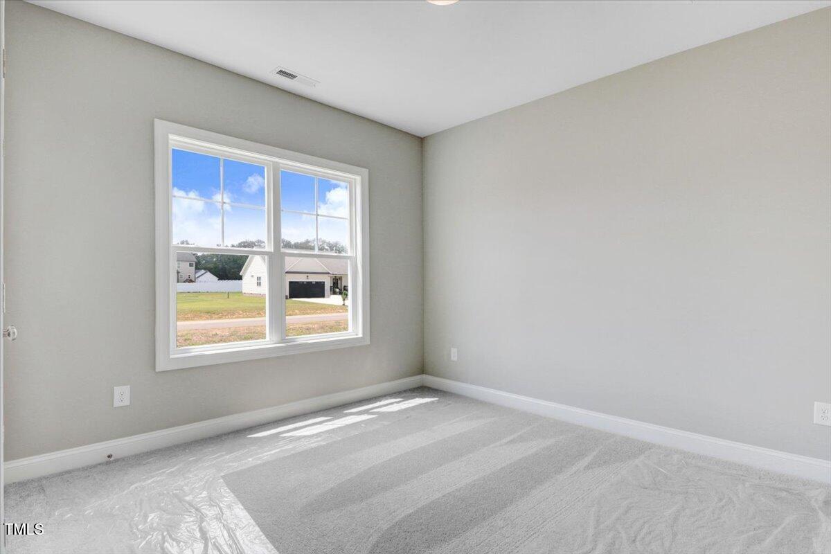 9550 Bear Run Lane Middlesex, NC 27557 - Photo 29 of 32 a view of an empty room with a window