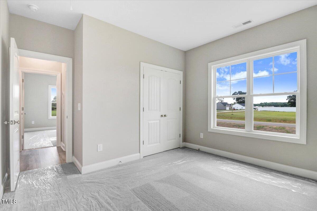 9550 Bear Run Lane Middlesex, NC 27557 - Photo 30 of 32 a view of an empty room with a window