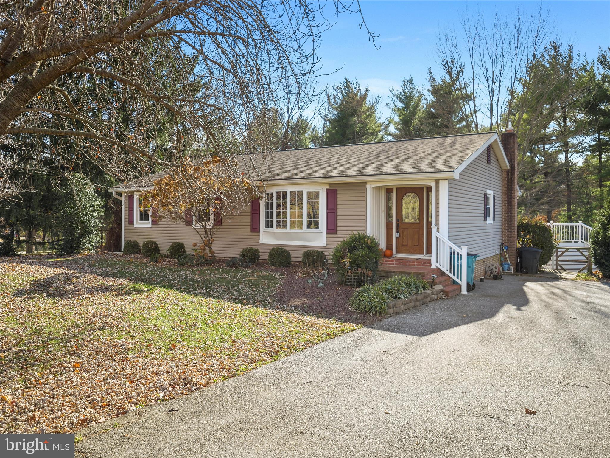 20315 Old Forge Road Hagerstown, MD 21742 - Photo 3 of 71 a front view of house with yard and trees around