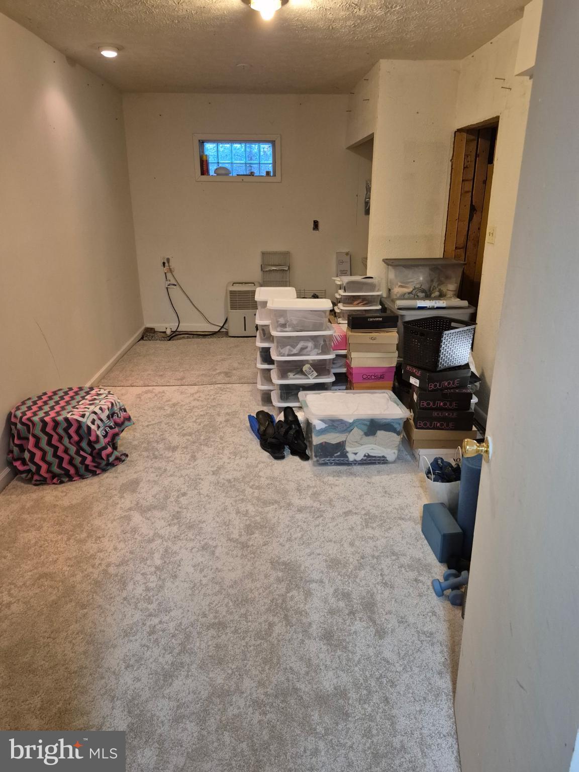 20315 Old Forge Road Hagerstown, MD 21742 - Photo 55 of 71 a room with furniture and a flat screen tv