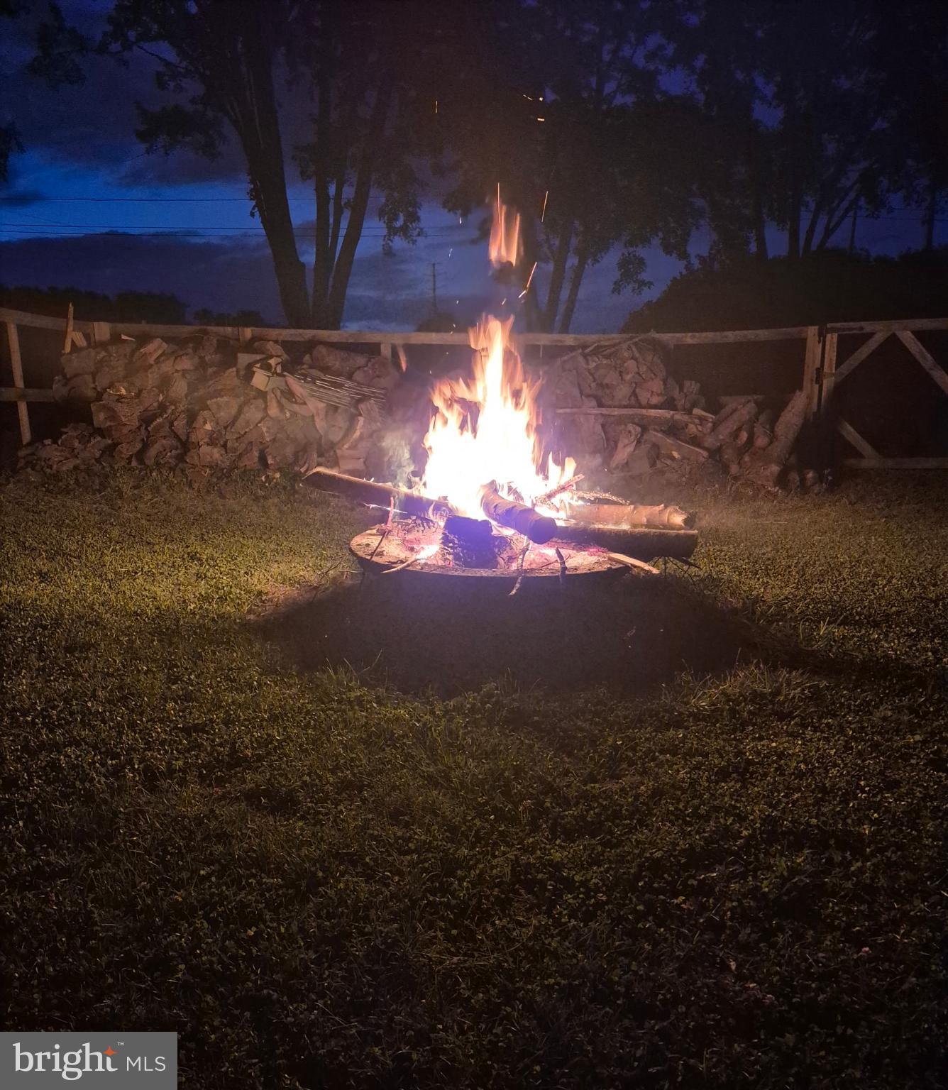 20315 Old Forge Road Hagerstown, MD 21742 - Photo 67 of 71 Cozy campfire under a starlit sky.