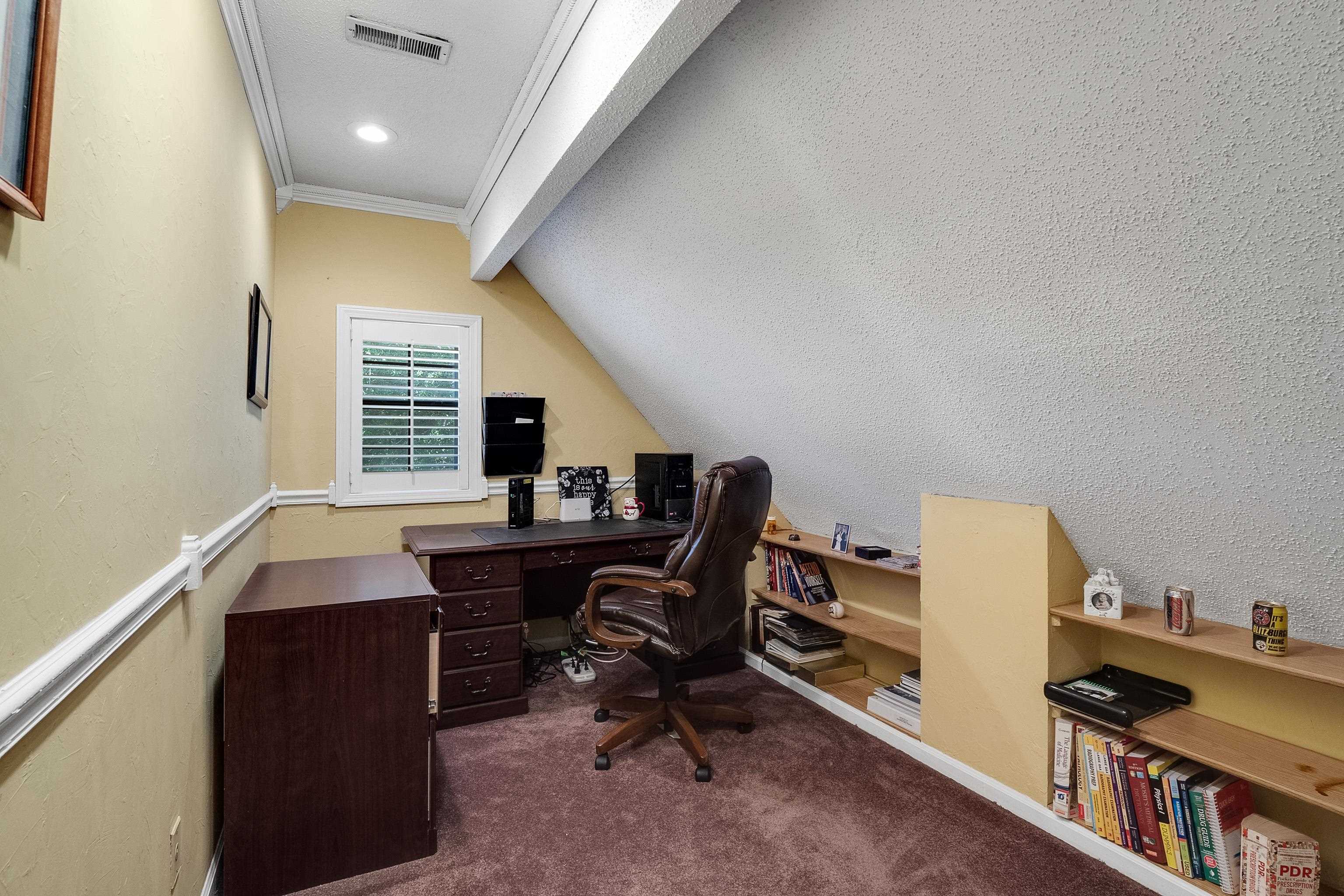 226 Wolf Ridge Cove Collierville, TN 38017 - Photo 16 of 25 a view of a workspace with furniture and a window