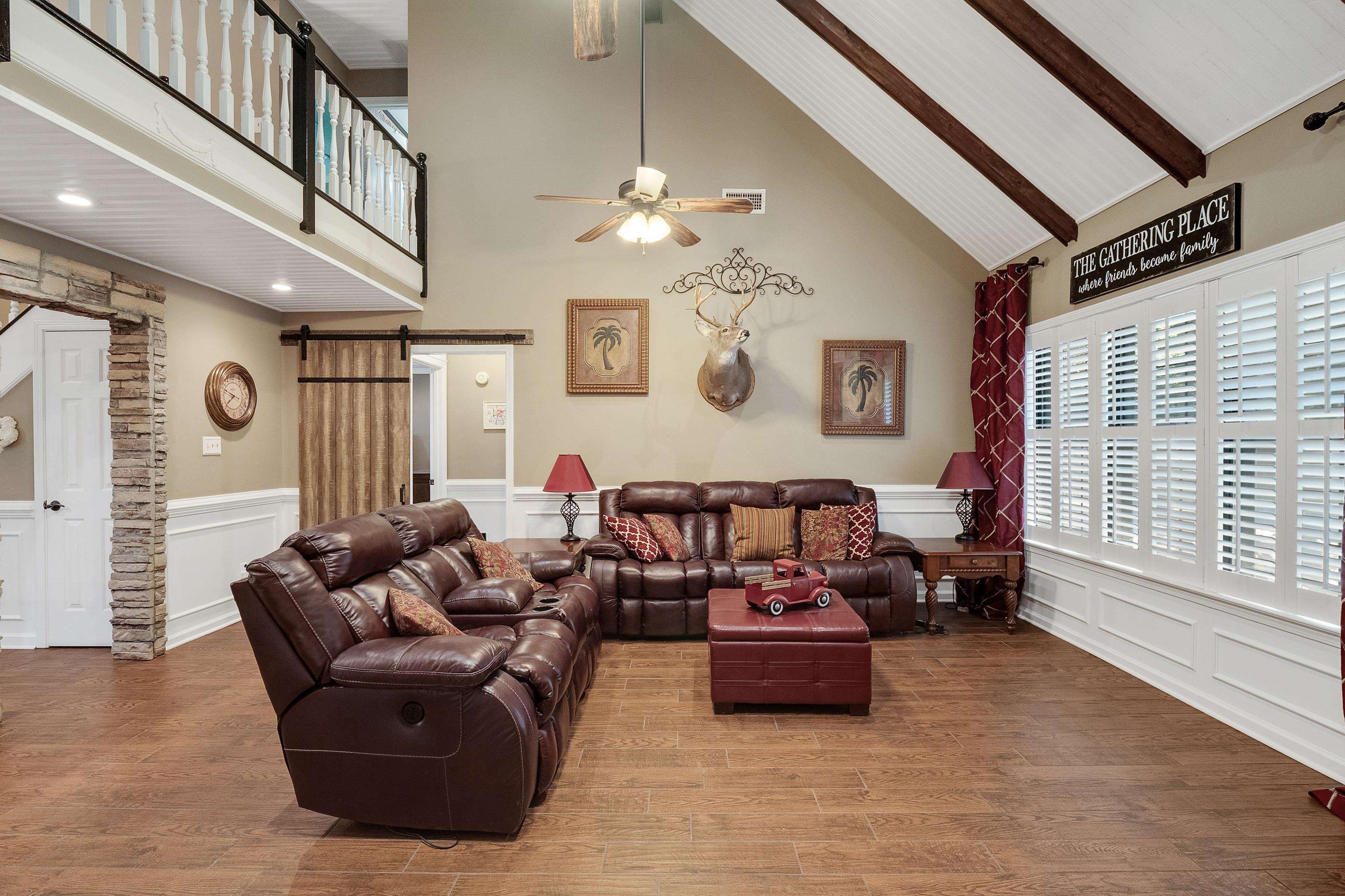 226 Wolf Ridge Cove Collierville, TN 38017 - Photo 5 of 25 a living room with furniture and a large window