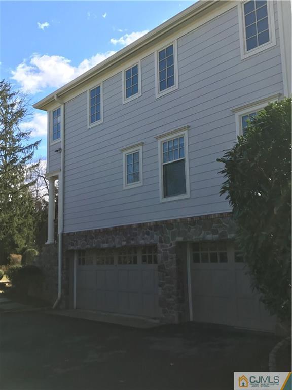 69 Athens Road Short Hills, NJ 07078 - Photo 21 of 25 a front view of a house with a yard