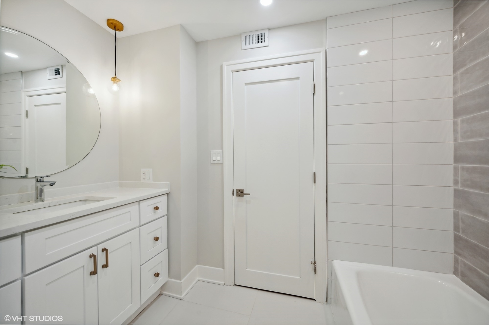 3801 Mission Hills Road, Unit 510 Northbrook, IL 60062 - Photo 15 of 21 a bathroom with a shower a sink and mirror