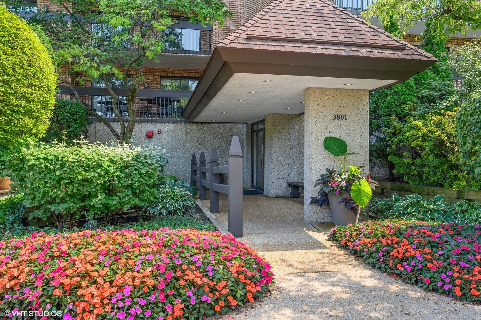 3801 Mission Hills Road, Unit 510 Northbrook, IL 60062 - Photo 3 of 21 a view of a patio with table and chairs and potted plants