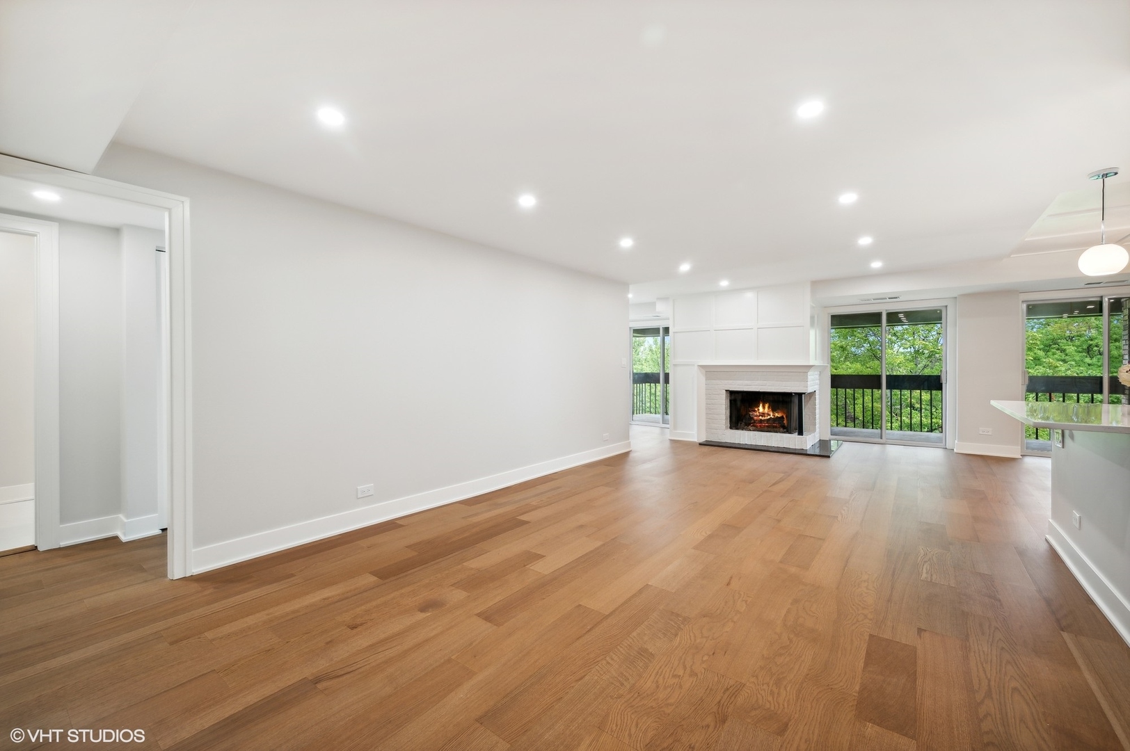3801 Mission Hills Road, Unit 510 Northbrook, IL 60062 - Photo 5 of 21 an empty room with wooden floor and windows