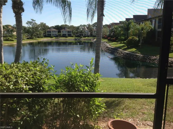 a view of a lake from a balcony