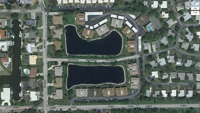 a view of a door of a brick house with a fountain