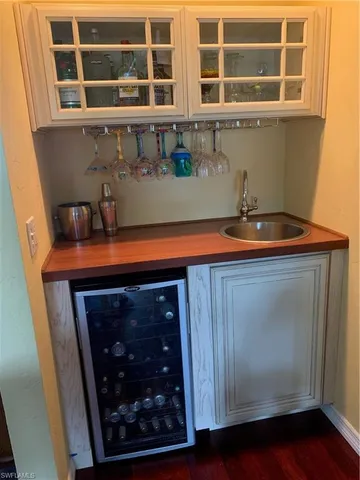 a room with an oven and cabinets