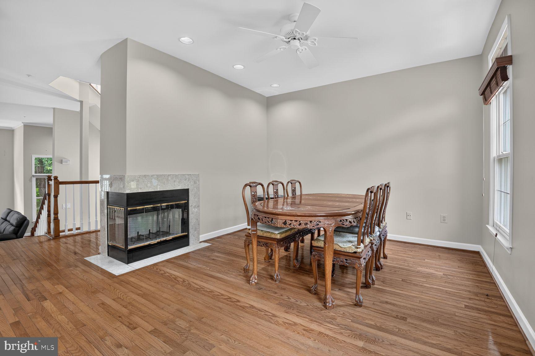 11432 Cedar Ridge Drive Potomac, MD 20854 - Photo 17 of 32 Elegant dining space with warm tones.