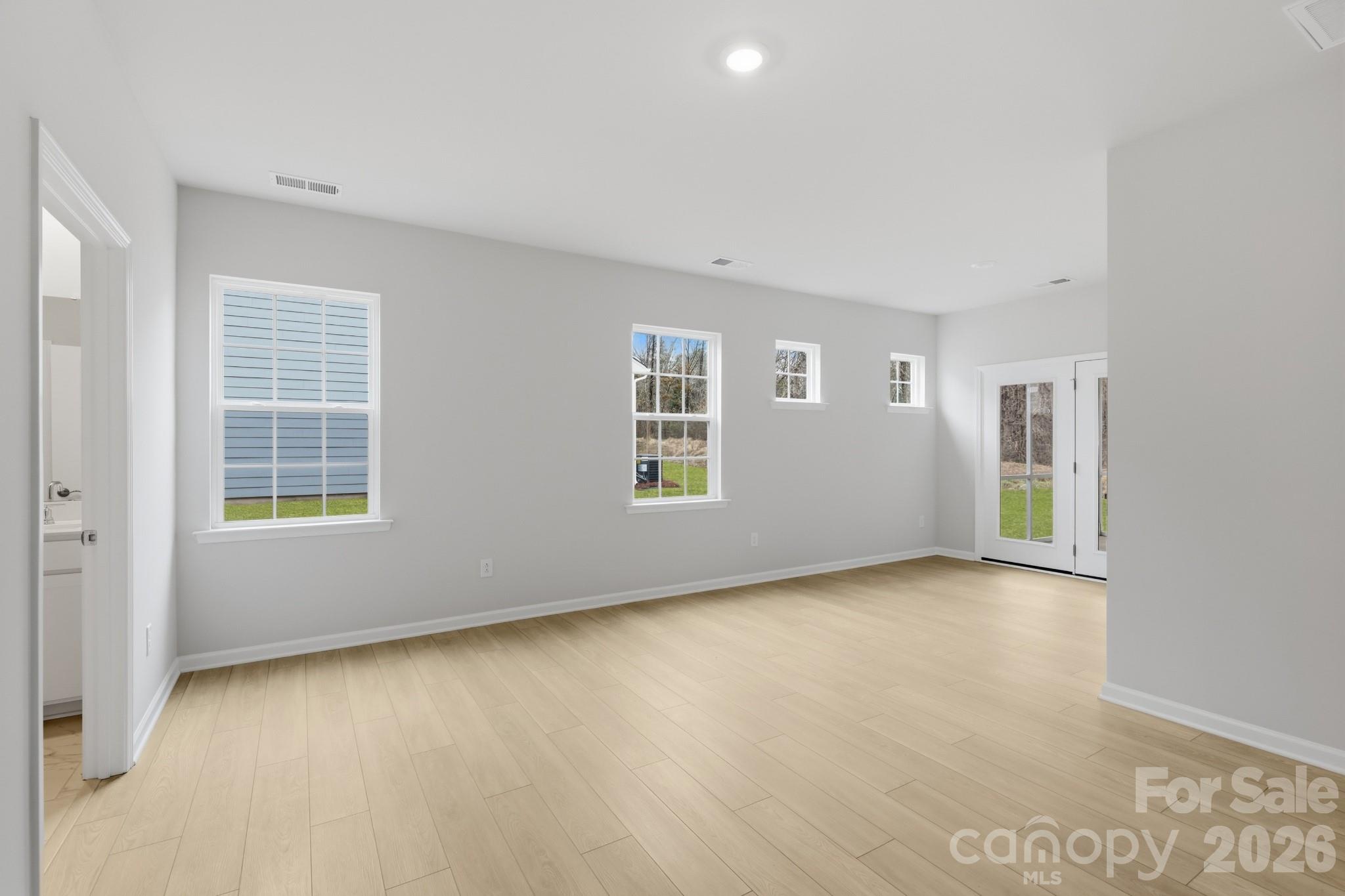 5450 Redbud Road, Unit 66 Lancaster, SC 29720 - Photo 11 of 35 an empty room with windows