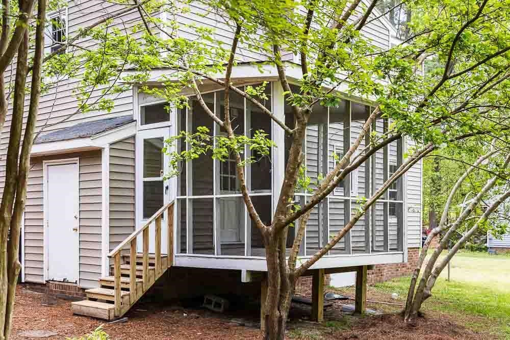 744 South Hollybrook Road Wendell, NC 27591 - Photo 22 of 30 The side of the home has a storage shed attached to the house. Exterior Back