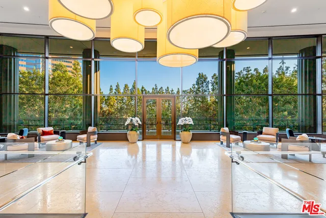 a view of a floor with dining table and chairs