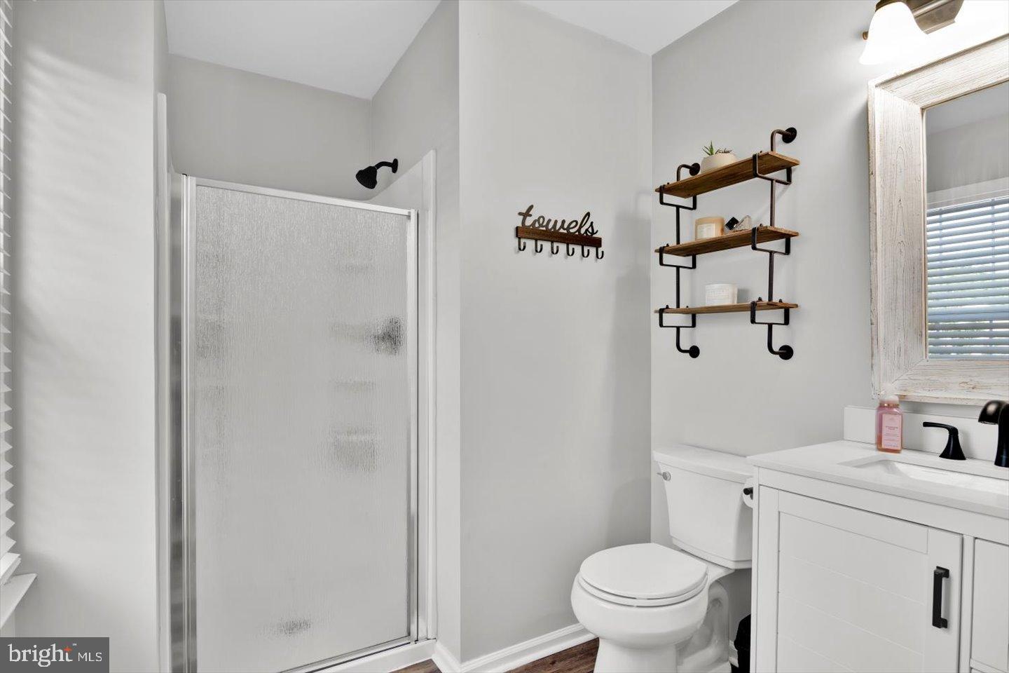 388 Sapling Way Atco, NJ 08004 - Photo 24 of 49 a bathroom with a granite countertop sink a toilet and shower