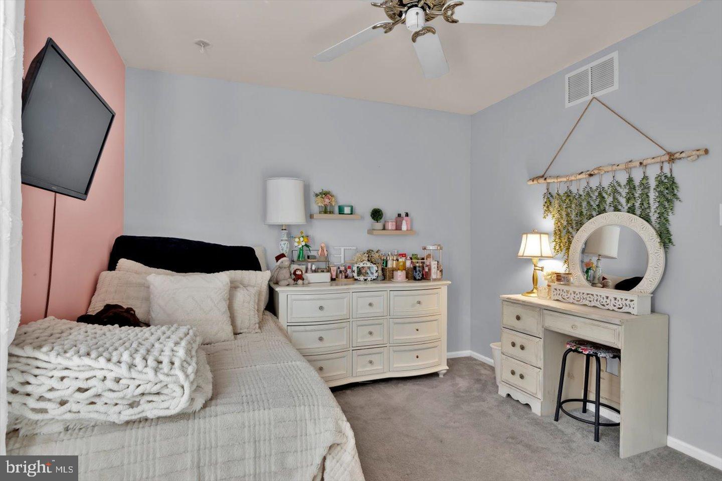 388 Sapling Way Atco, NJ 08004 - Photo 28 of 49 a bedroom with furniture and a mirror