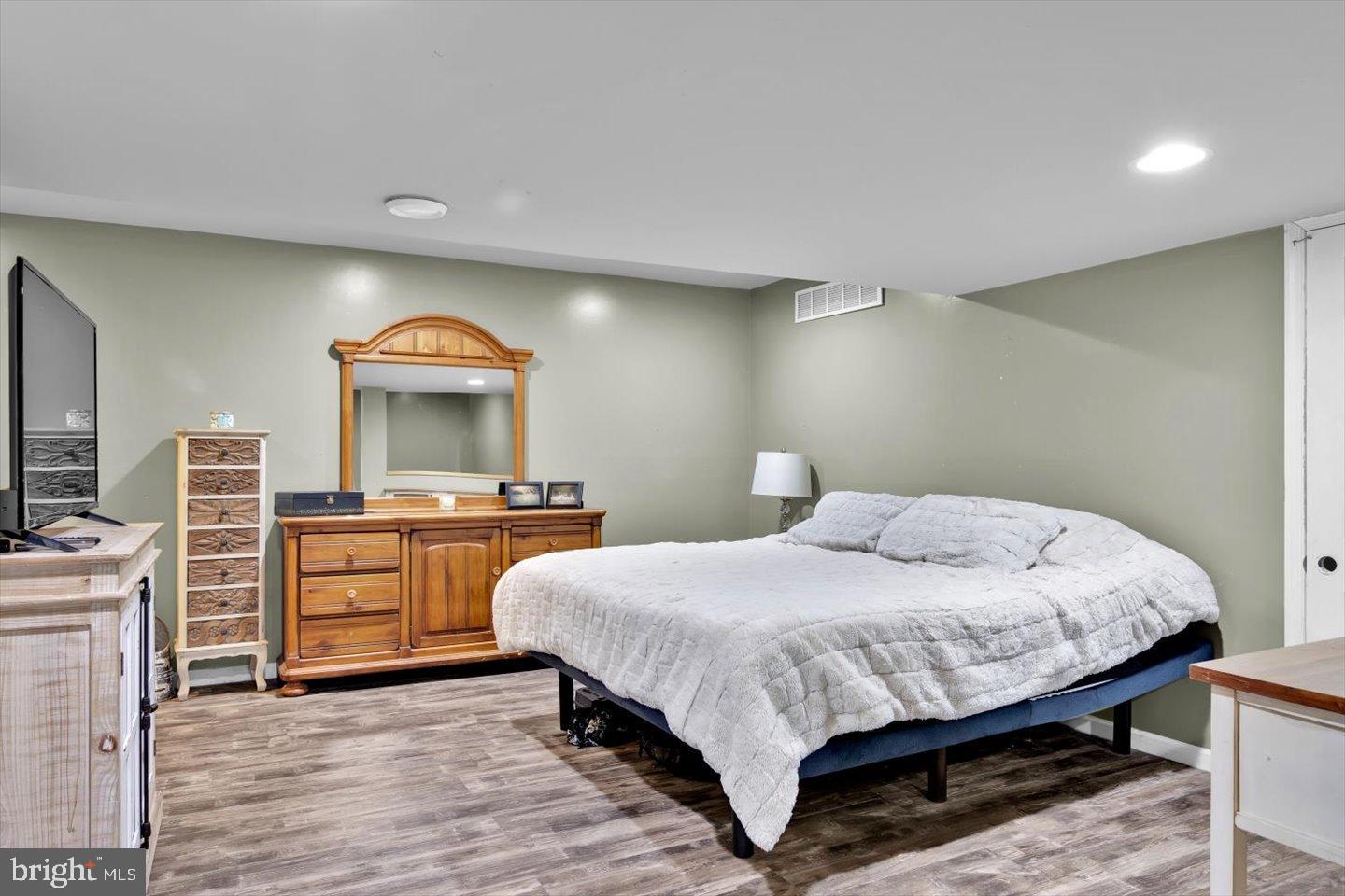 388 Sapling Way Atco, NJ 08004 - Photo 36 of 49 a bedroom with a bed and a desk