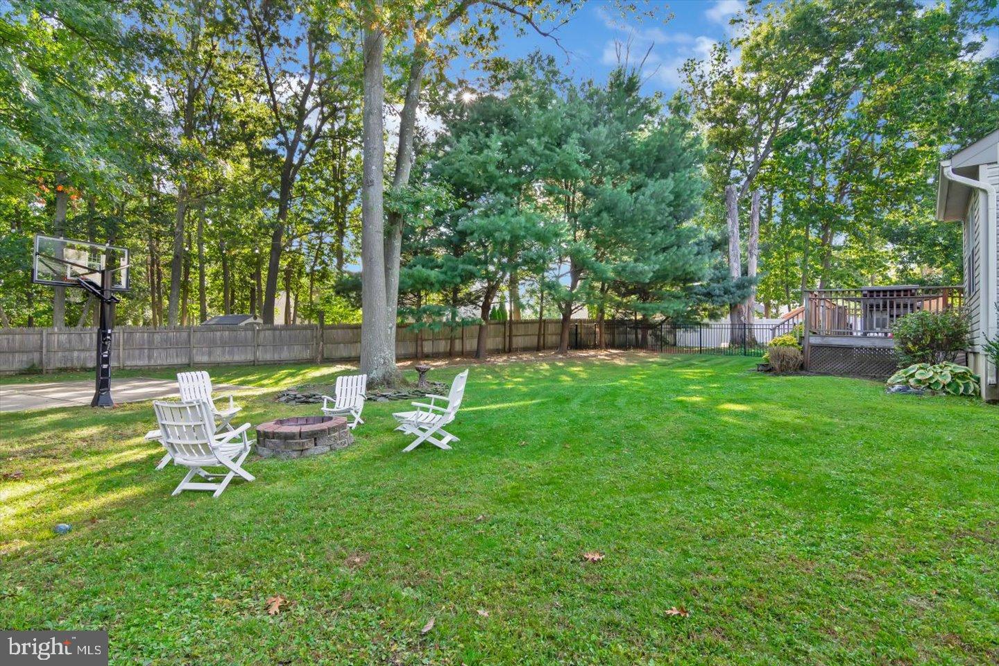 388 Sapling Way Atco, NJ 08004 - Photo 45 of 49 a view of backyard with a table and chairs