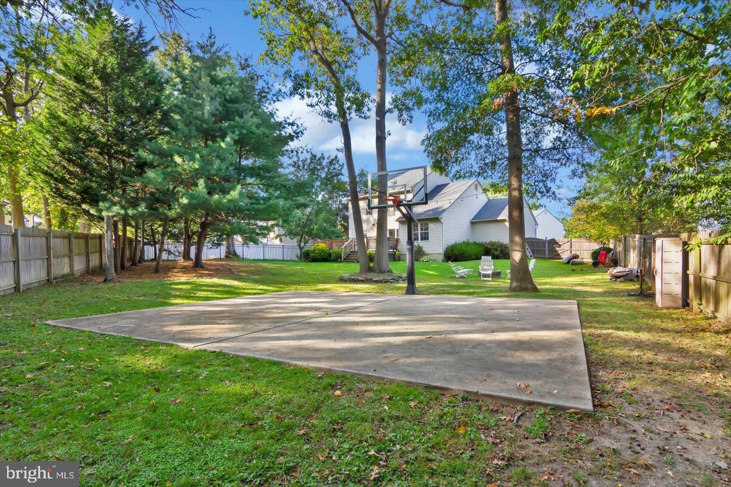 388 Sapling Way Atco, NJ 08004 - Photo 46 of 49 a view of a fountain in front of a house with a big yard and large trees