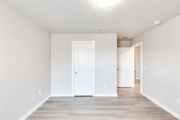 a view of storage and utility room with washer and dryer