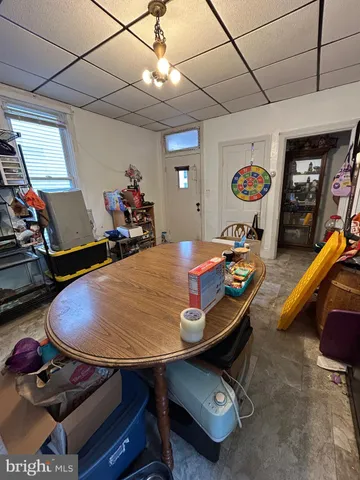 a room with furniture and wooden floor