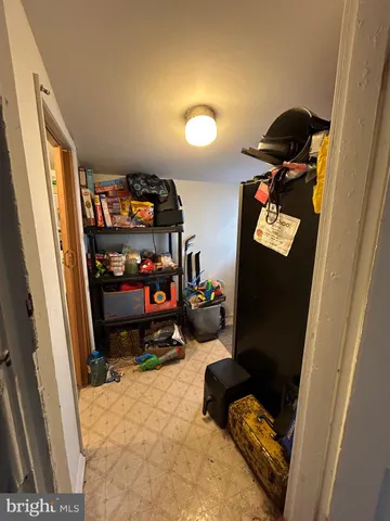 a bedroom with double bunk beds and a window