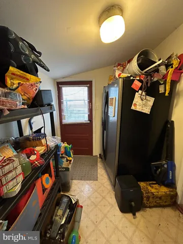 a bathroom with a toilet a sink and a mirror