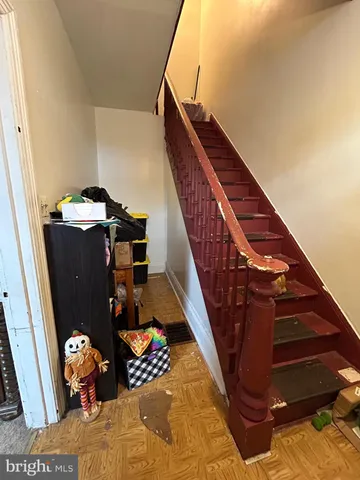 a view of entryway with wooden floor