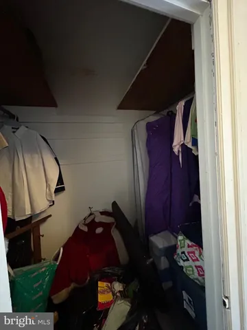 a living room with furniture pool table and a window
