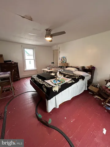 a view of a patio with a table and chairs