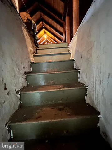 a view of a chairs and table in a patio