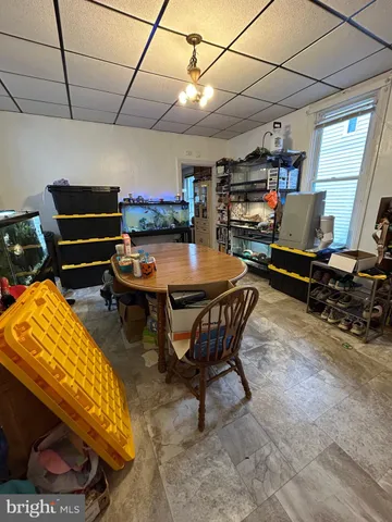 a room with furniture and a flat screen tv