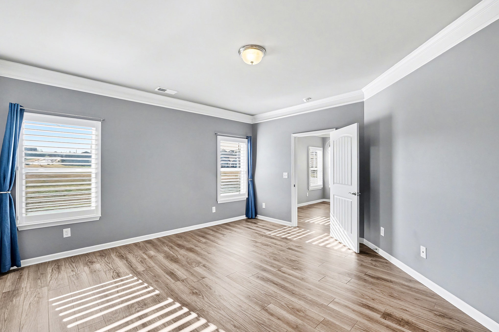 2932 Timewinder Way Columbia, TN 38401 - Photo 18 of 37 a view of empty room with wooden floor and fan