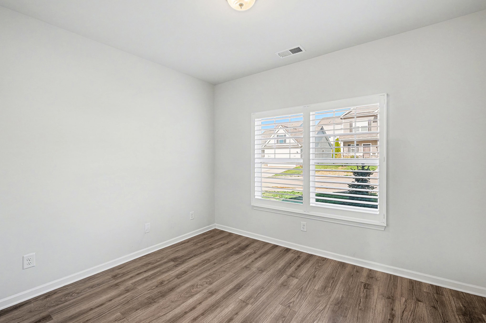 2932 Timewinder Way Columbia, TN 38401 - Photo 25 of 37 an empty room with wooden floor and windows