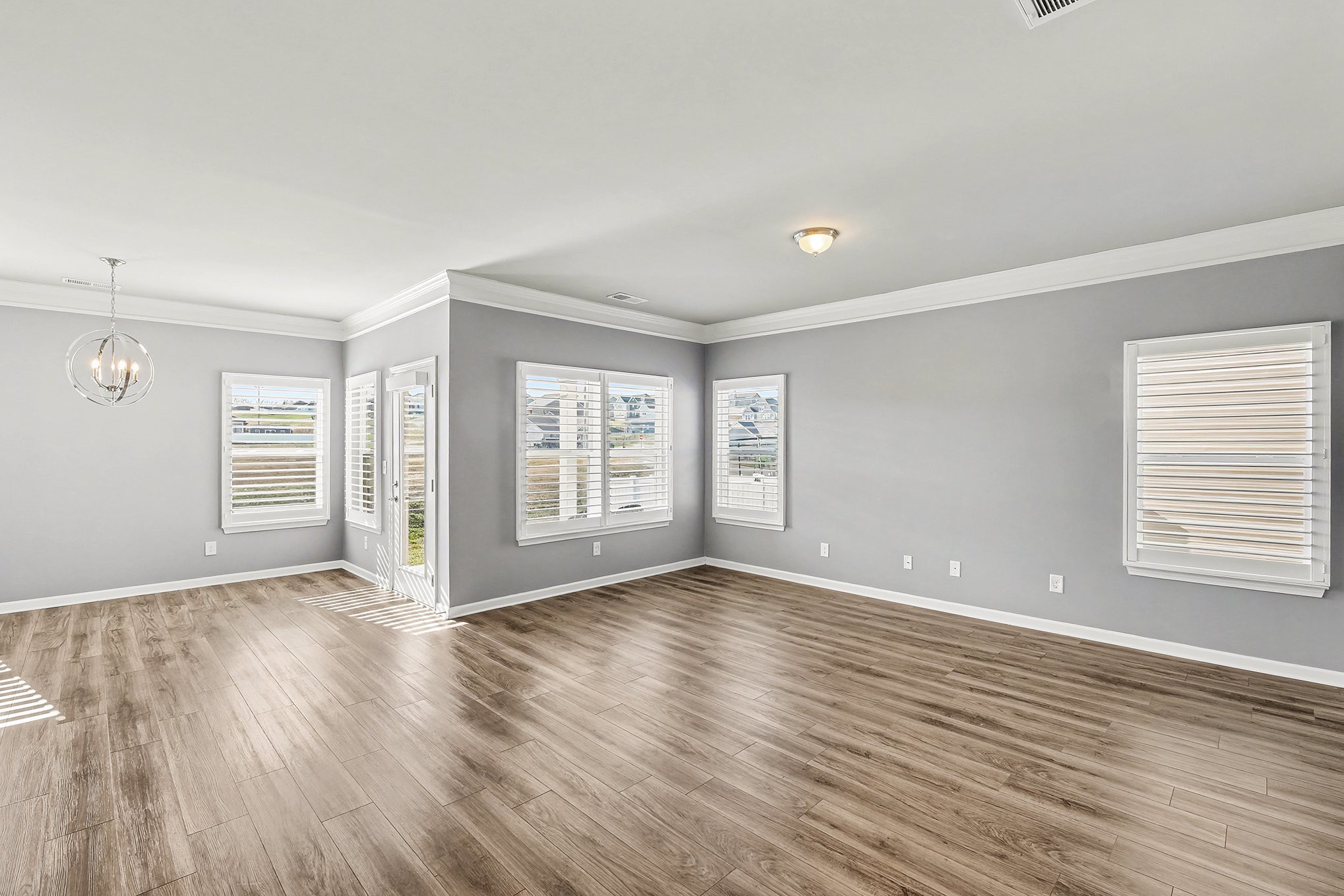2932 Timewinder Way Columbia, TN 38401 - Photo 5 of 37 a view of an empty room with wooden floor and a window
