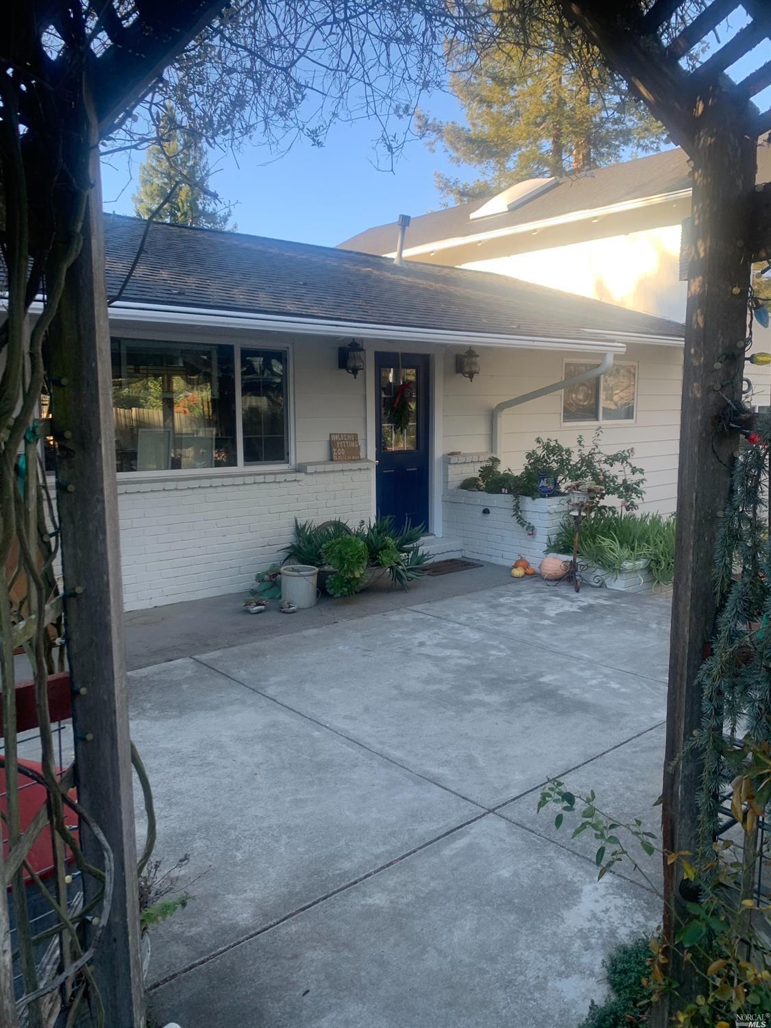 5243 Hutchinson Road Sebastopol, CA 95472 - Photo 1 of 1 a view of a house with porch and garden