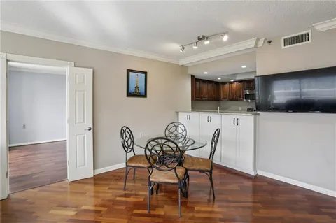a view of a livingroom with furniture and wooden floor