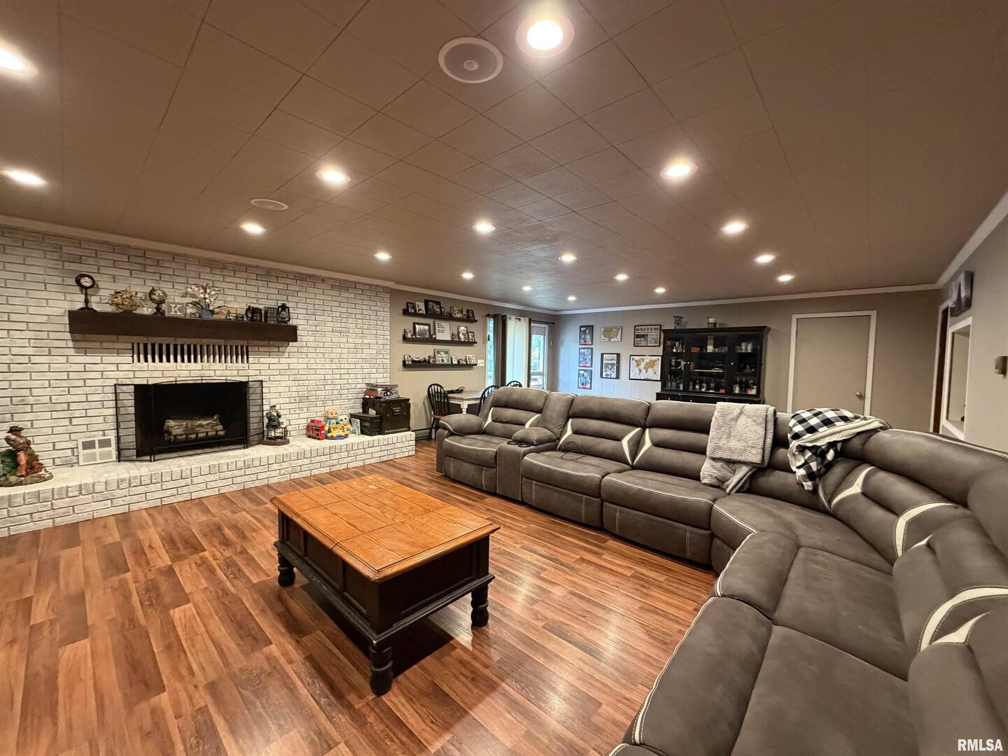 117 Marshall Place Carmi, IL 62821 - Photo 2 of 25 a living room with furniture and a fireplace